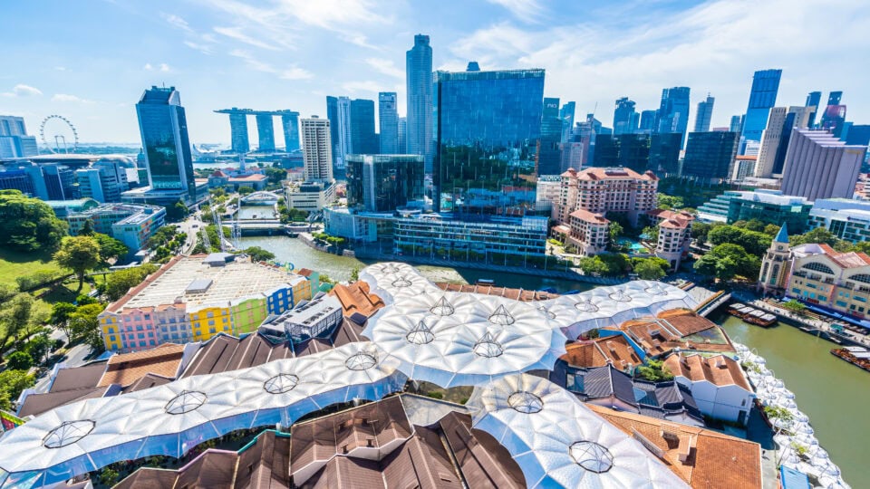 Modern cityscape with unique rooftops.