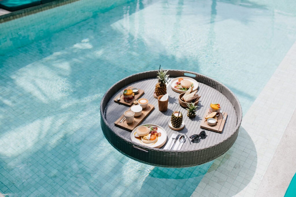Floating breakfast table in pool