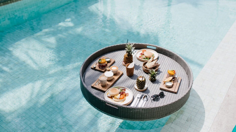 Floating breakfast table in pool