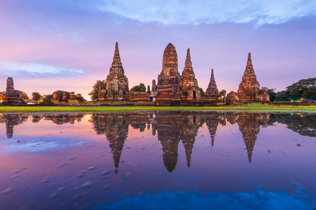 Historic temple reflecting in water.