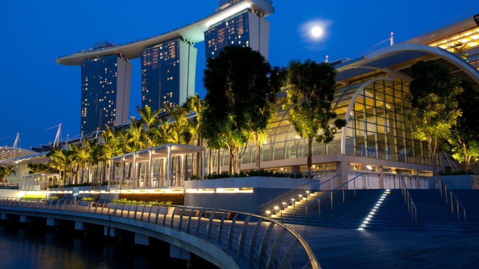 Illuminated waterfront at night.