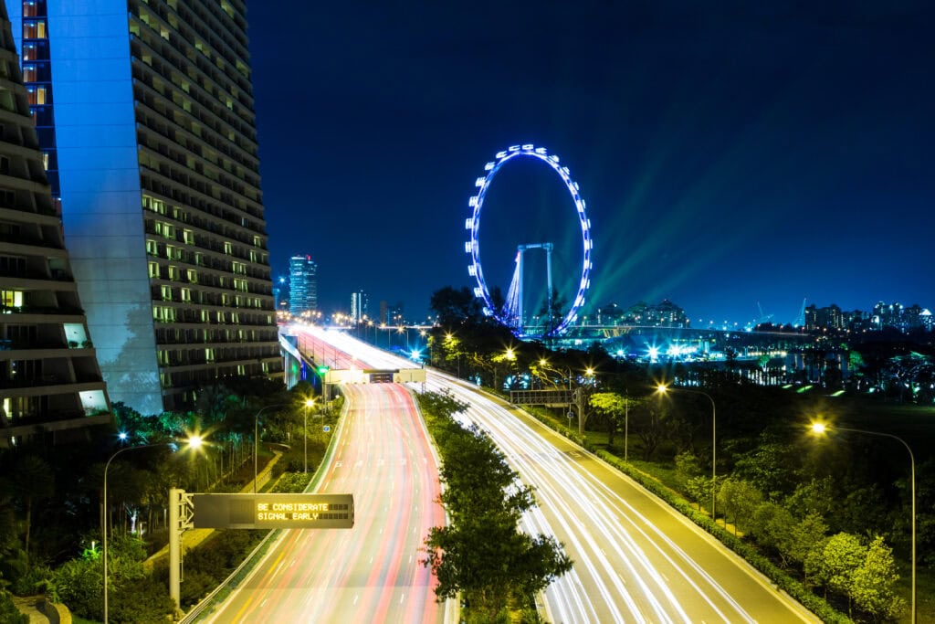 Night view of Singapore skyline and highway