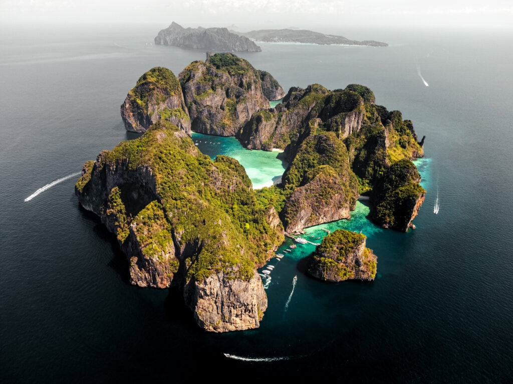 Lush green islands surrounded by turquoise waters.