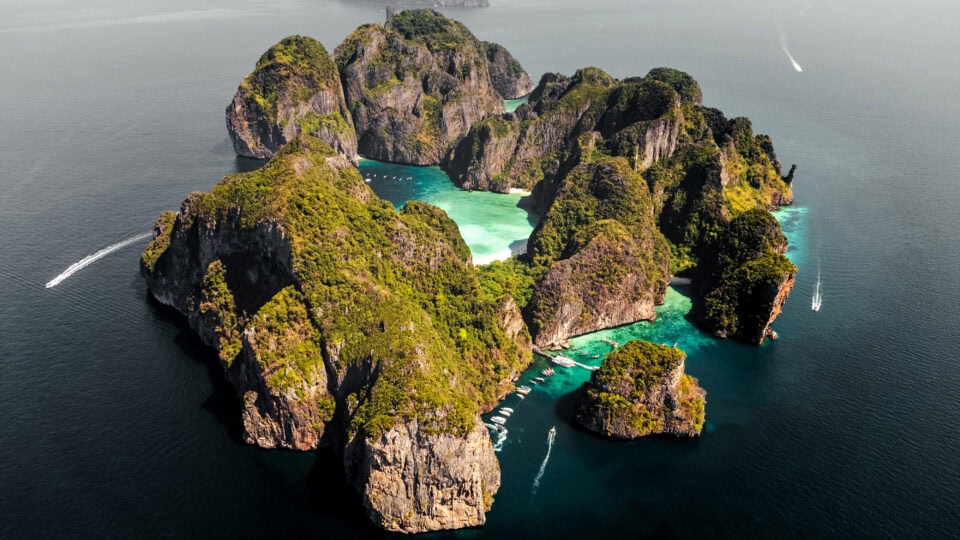 Lush green islands surrounded by turquoise waters.