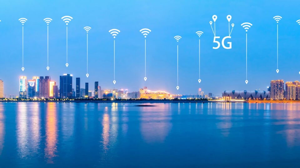 City skyline with 5G network indicators.