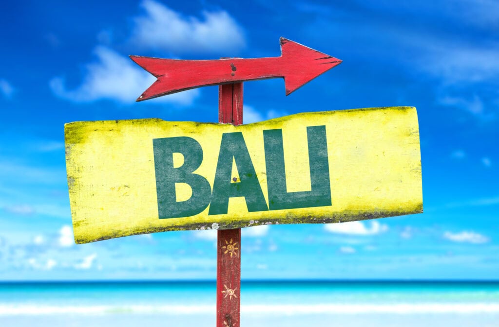 Signpost pointing to Bali beach