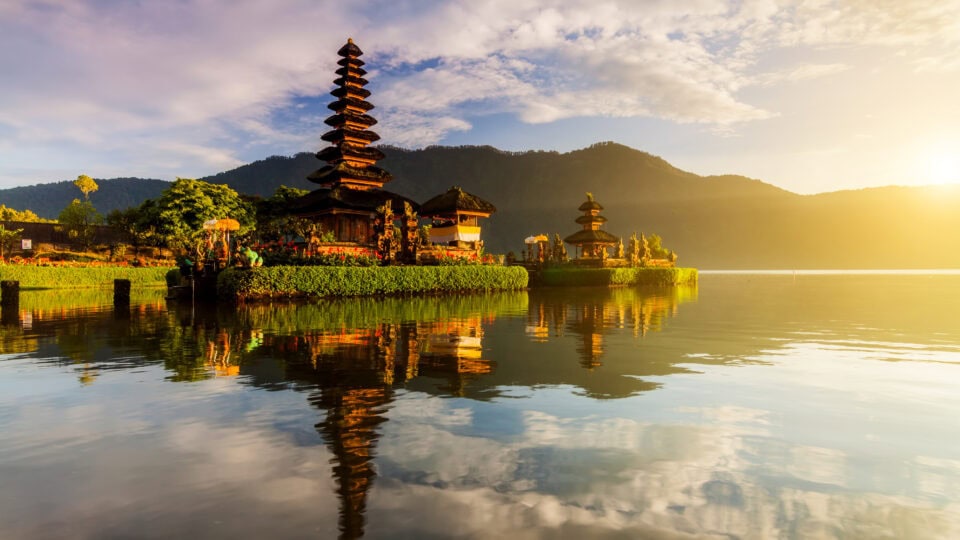 Serene temple reflecting on water
