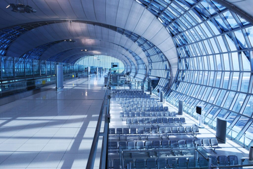 Modern airport lounge with large windows