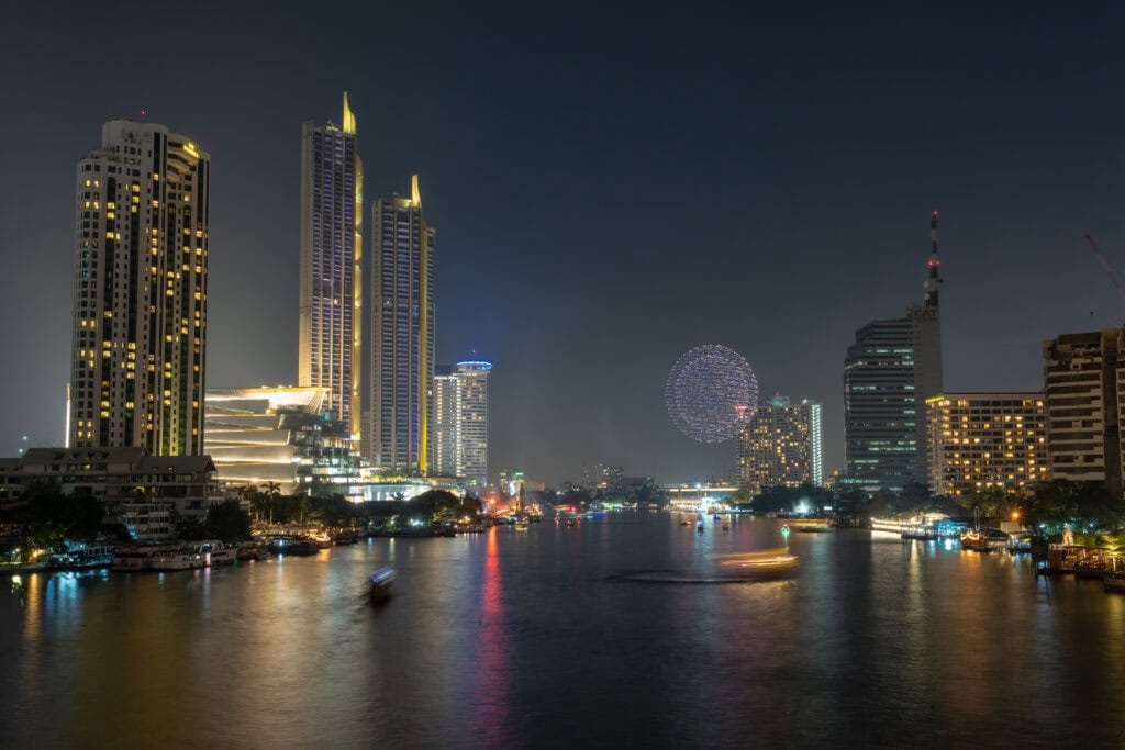 Night view of Bangkok skyline and river