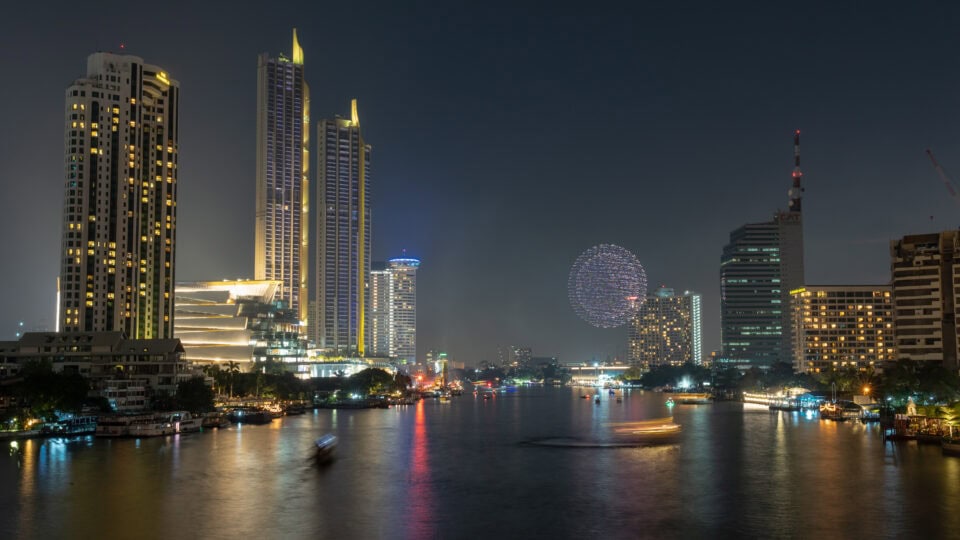 Night view of Bangkok skyline and river