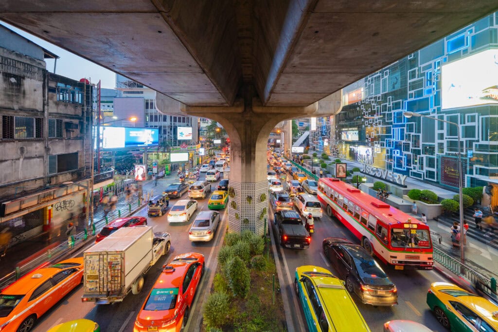 Busy urban street with colorful traffic