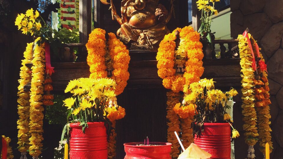 Colorful altar with offerings and flowers
