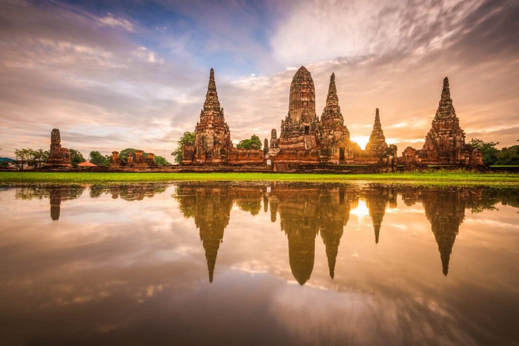 Historic temple reflecting in water.