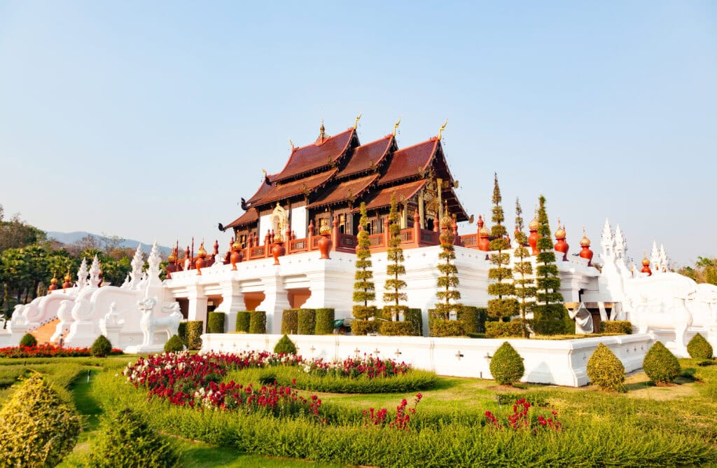 Traditional Thai architecture surrounded by gardens.