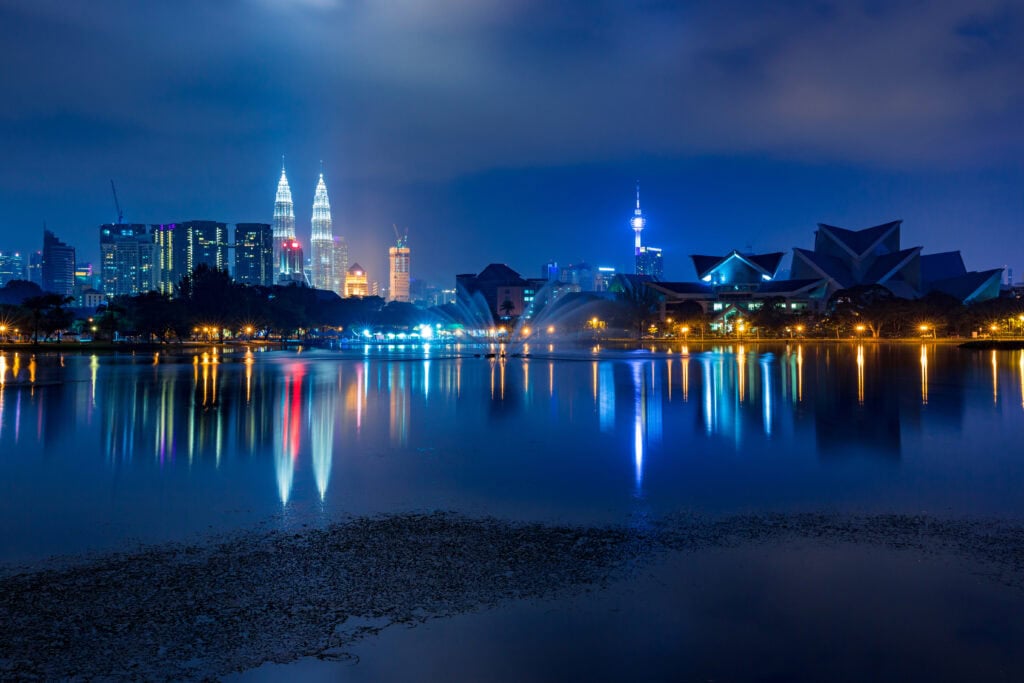 City skyline illuminated at night.