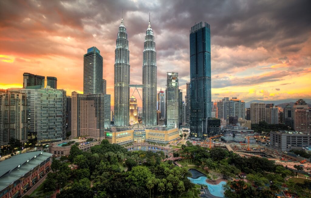 City skyline at sunset with towers