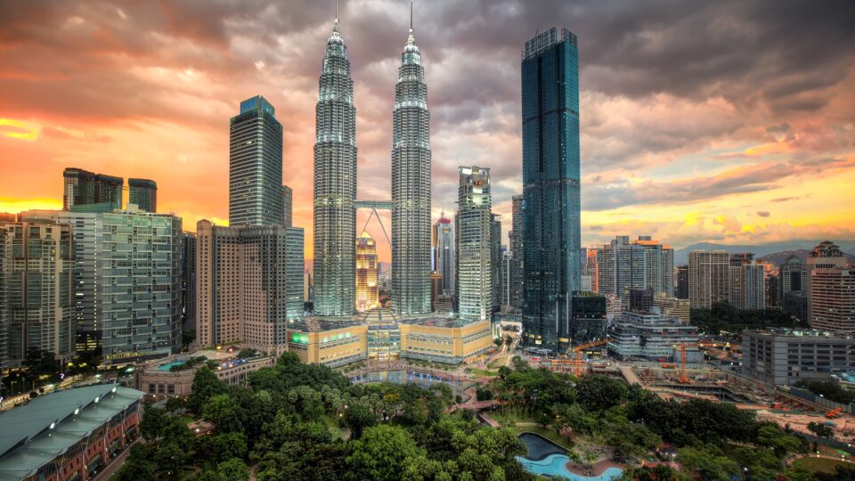 City skyline at sunset with towers
